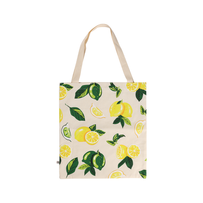 Model wearing light green backpack with black canvas straps and front zipper pouch.