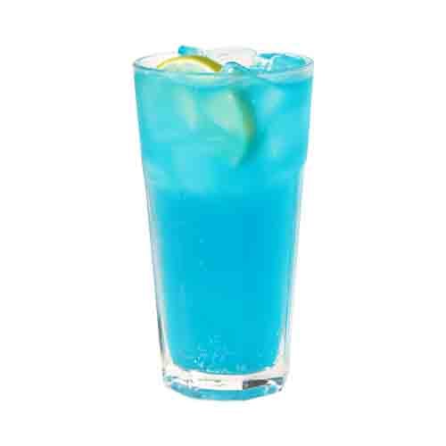 Model wearing light green backpack with black canvas straps and front zipper pouch.