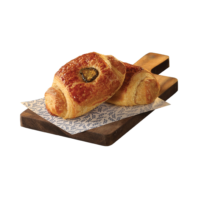 Model wearing light green backpack with black canvas straps and front zipper pouch.